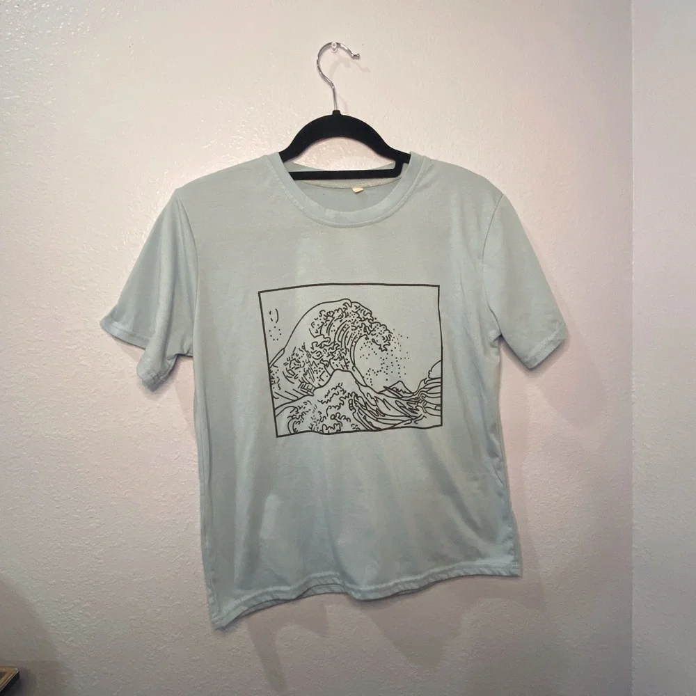 Cotton light blue shirt with wave design on front. - Picture 2 of 3